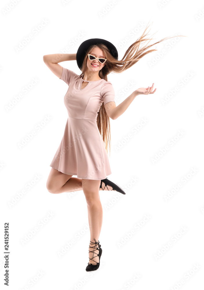Beautiful young woman dancing on white background Beautiful young woman dancing on white background