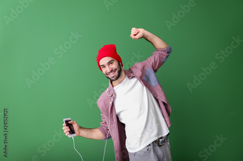 Handsome young man dancing ...