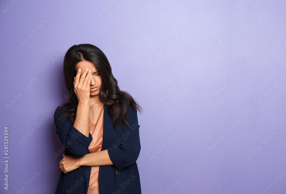 Stressed young woman on color background Stressed young woman on color background