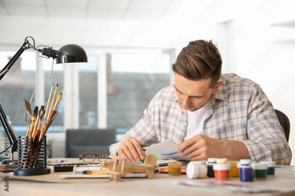 Young designer working in office Young designer working in office