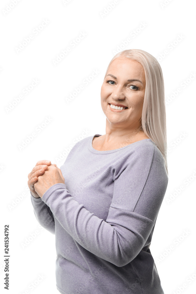 Portrait of beautiful mature woman on white background