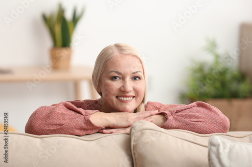 Smiling mature woman relaxi...