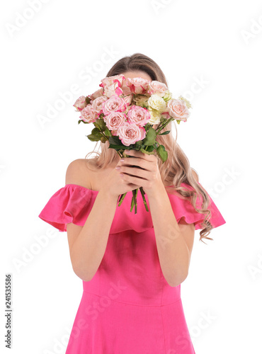 Beautiful young woman with bouquet of flowers on white background