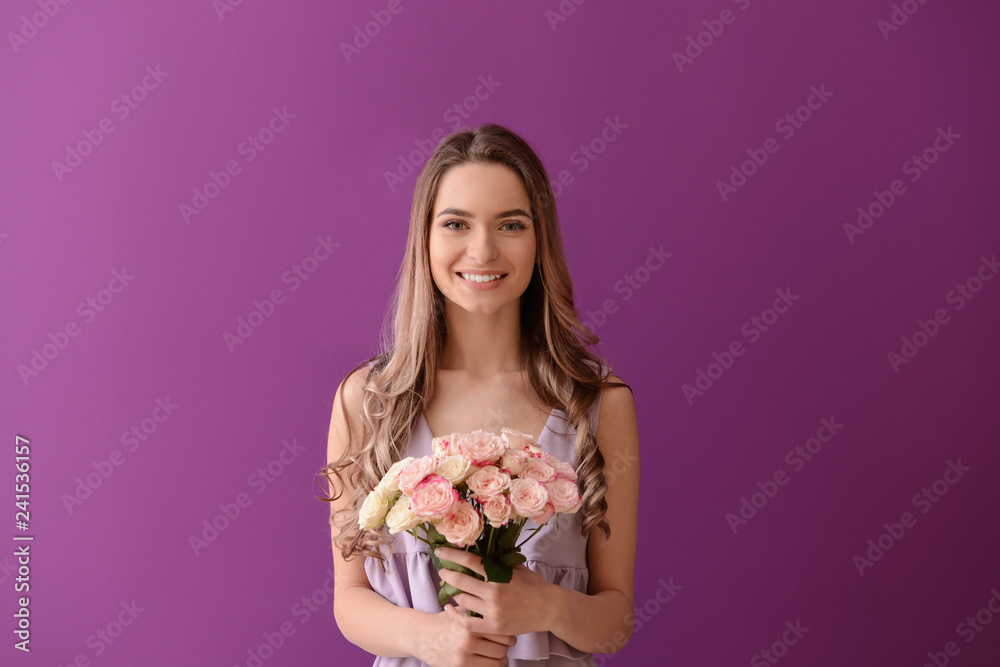 Beautiful young woman with bouquet of flowers on color background Beautiful young woman with bouquet of flowers on color background