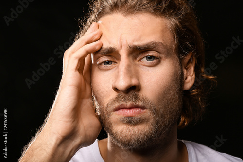 Young man suffering from he...