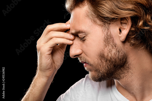 Young man suffering from he...