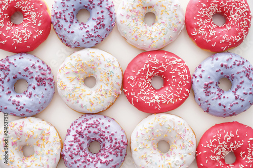 Tasty doughnuts on white background