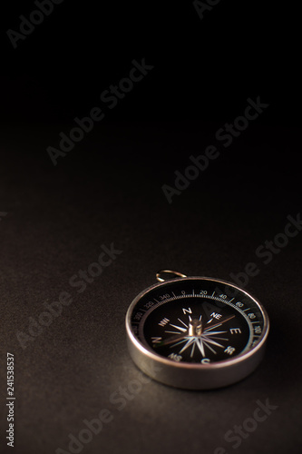Closeup shot of a metalic compass