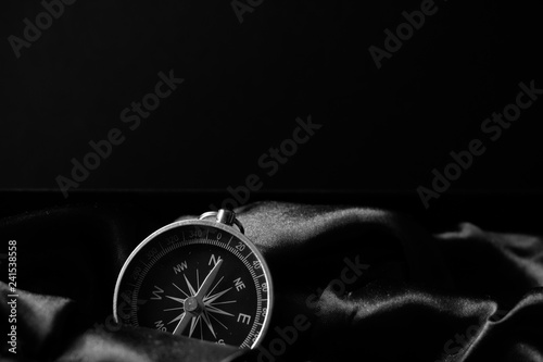 Closeup shot of a metalic compass
