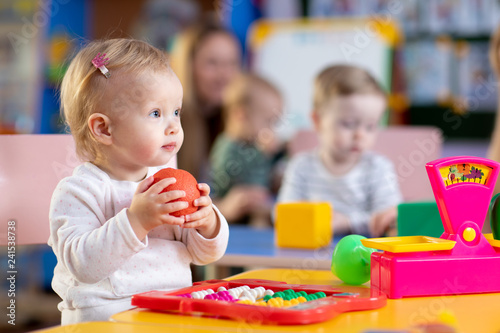 Cute little child playing w...