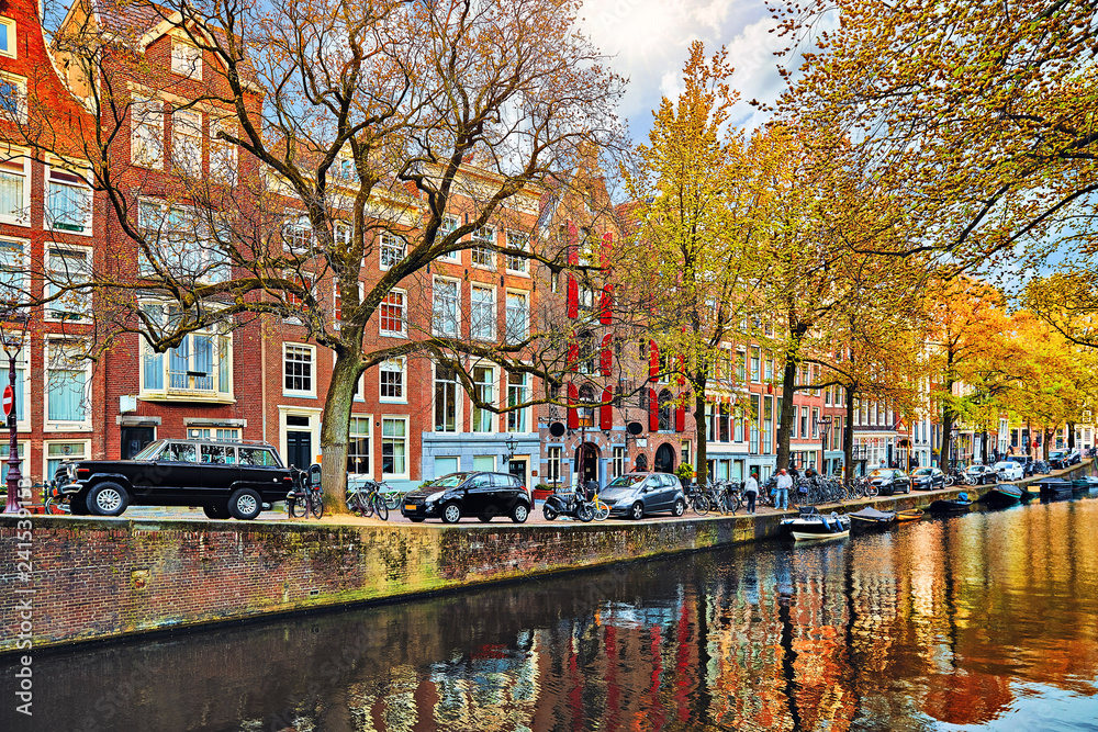 Amsterdam, Netherlands. Street with cars and traditional dutch