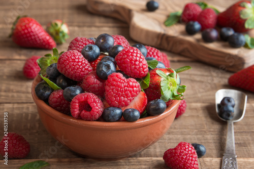 Fresh fruit salad on wooden table