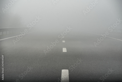 Foggy highway empty road