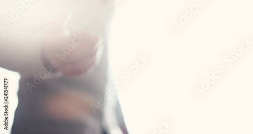 Angelic person appears with open hand reaching out for you to join in the afterlife.