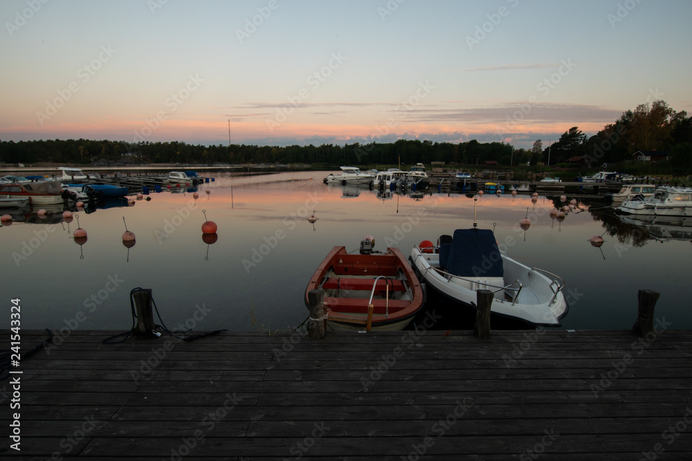 Fototapeta premium boats at sunset