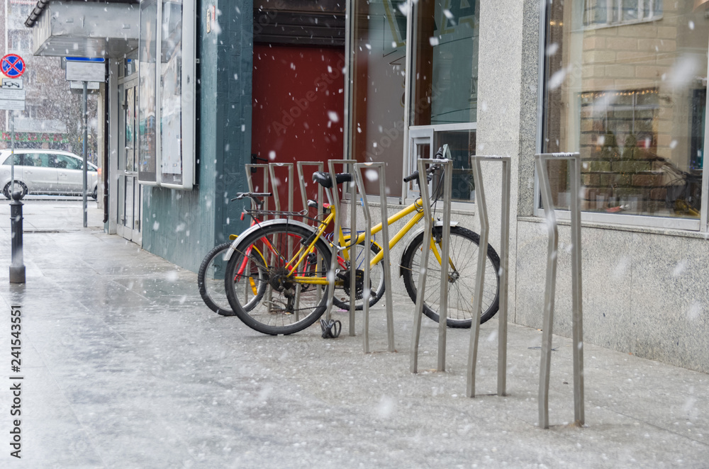 Warsaw bicycle parking at snowy winter day