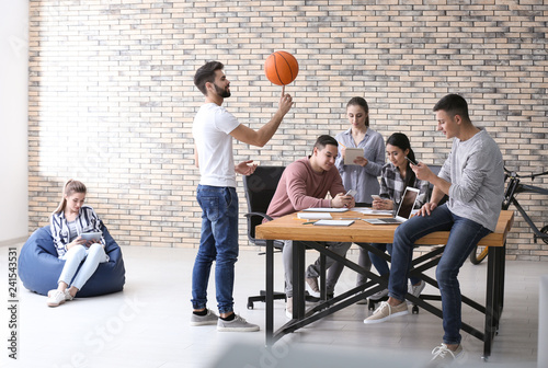 Team of young people in office