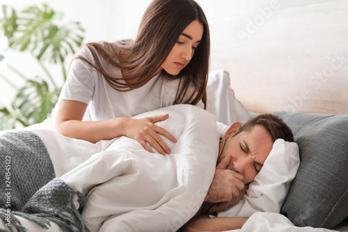 Woman taking care of her hu...