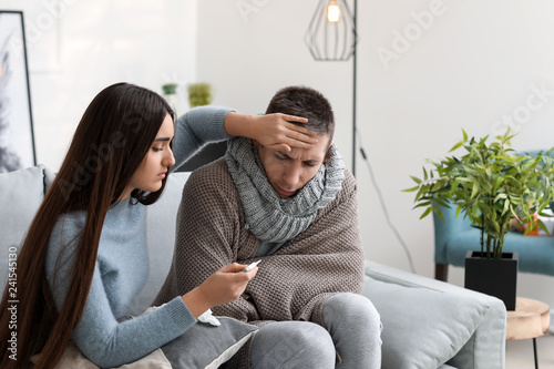 Woman taking care of her hu...