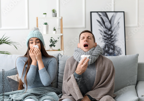 Couple ill with flu at home