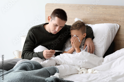 Father taking care of his s...
