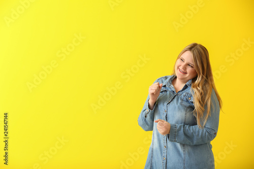 Happy plus size girl on col...