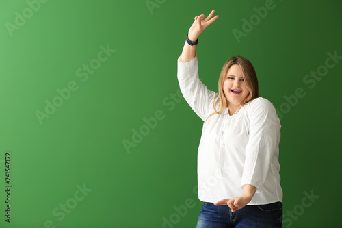 Happy plus size girl on col...