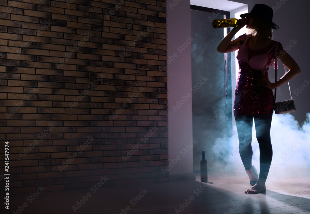 Young drunk woman after party at home. Concept of alcoholism Young drunk woman after party at home. Concept of alcoholism