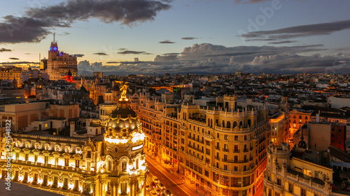 Evening view on the Gran Via shopping street in the city centre of Madrid, Spain, 