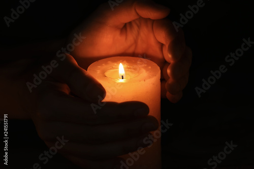 Human hands protecting a bu...