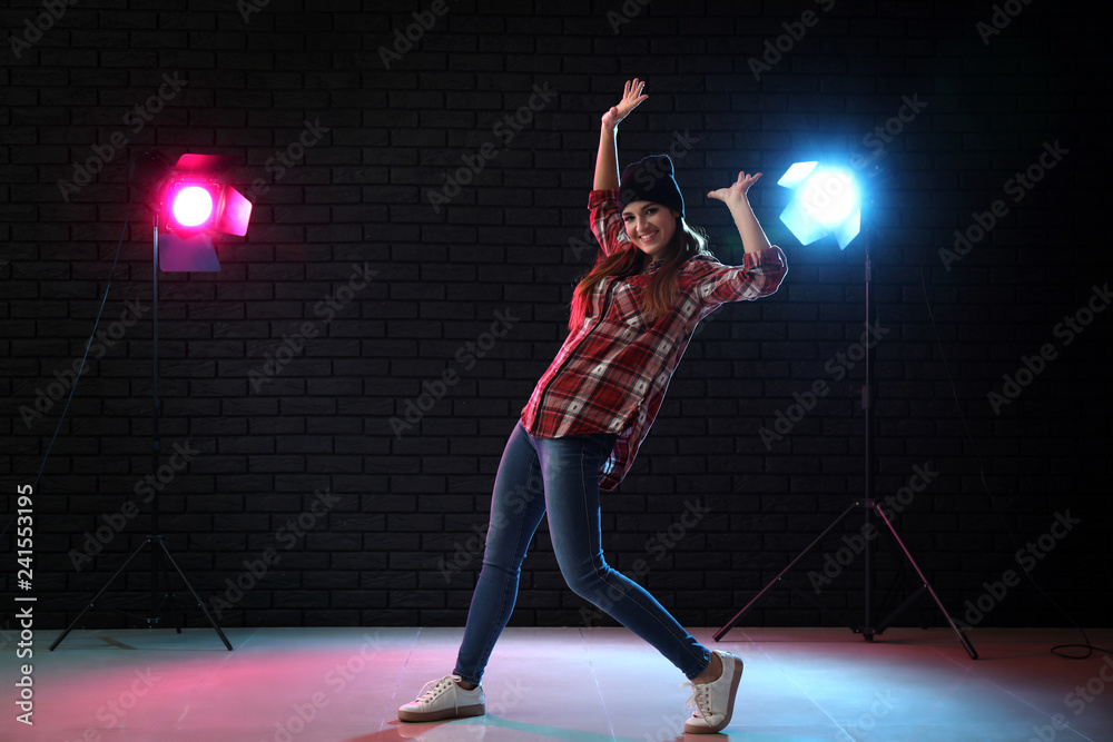 Young woman dancing in club