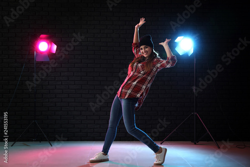Young woman dancing in club