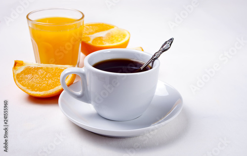 Cup of coffee and fruits and berries on the white background