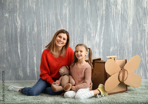 Portrait of happy mother wi...