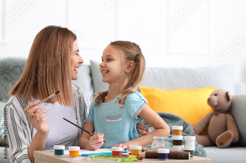 Happy mother with daughter ...