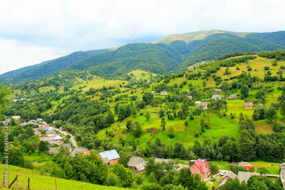 Nature in the mountains, beautiful scenery, beautiful mountain cenery, the Carpathian Mountains, a village in the mountains.