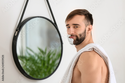 Handsome man with shaving f...