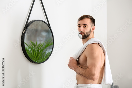 Handsome man with shaving f...