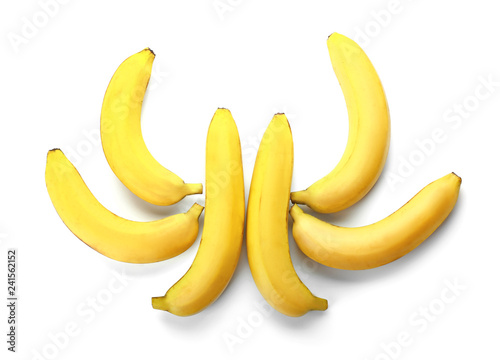 Ripe sweet bananas on white background