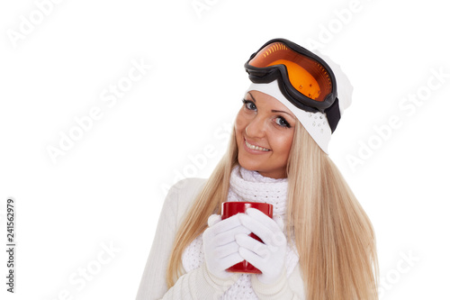 Young woman  in ski glasses  with red cup.