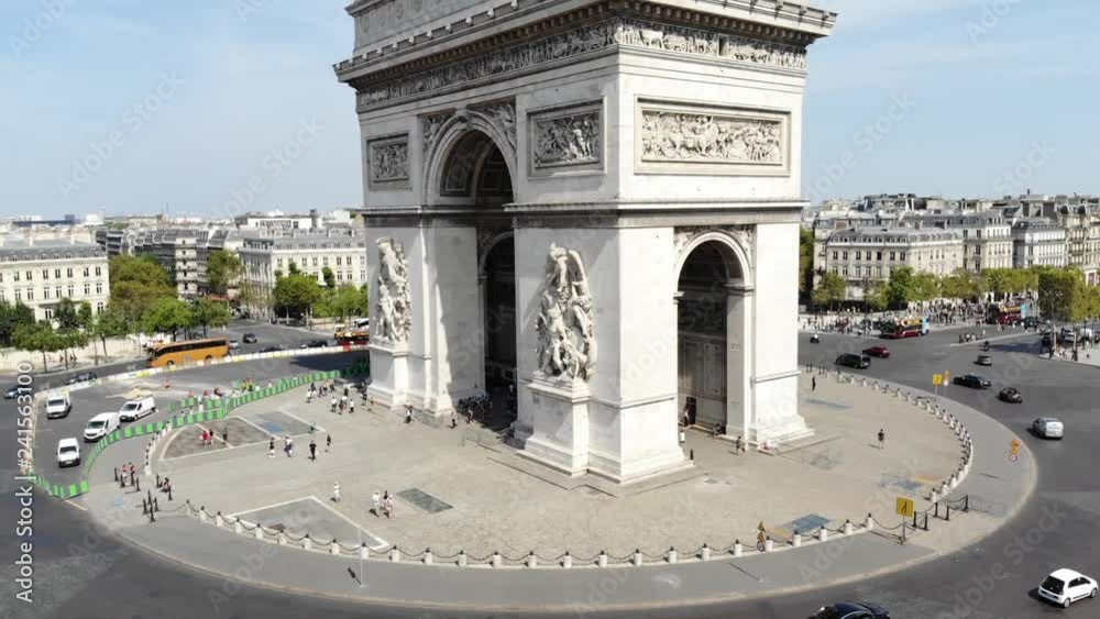 Arc de Triomphe on square Place Charles de Gaulle at sunny day. Aerial view