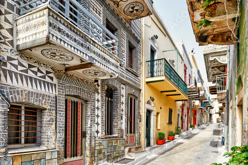 Traditional houses decorated with the scratch patterns in Pyrgi of Chios, Greece photo