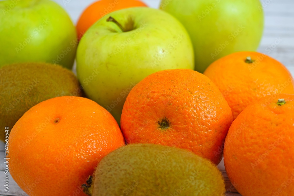 Delicious and fresh fruit on wooden background. Delicious and fresh fruit on wooden background.