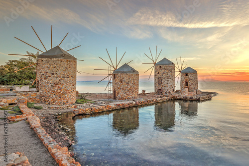 Sunrise at the windmills in Chios, Greece photo