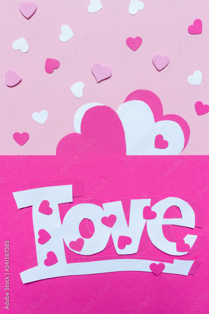Layout card for the holiday Valentine's Day. Hearts of the word love from paper scrapbooking, origami, handmade on a pink background Layout card for the holiday Valentine's Day. Hearts of the word love from paper scrapbooking, origami, handmade on a pink background
