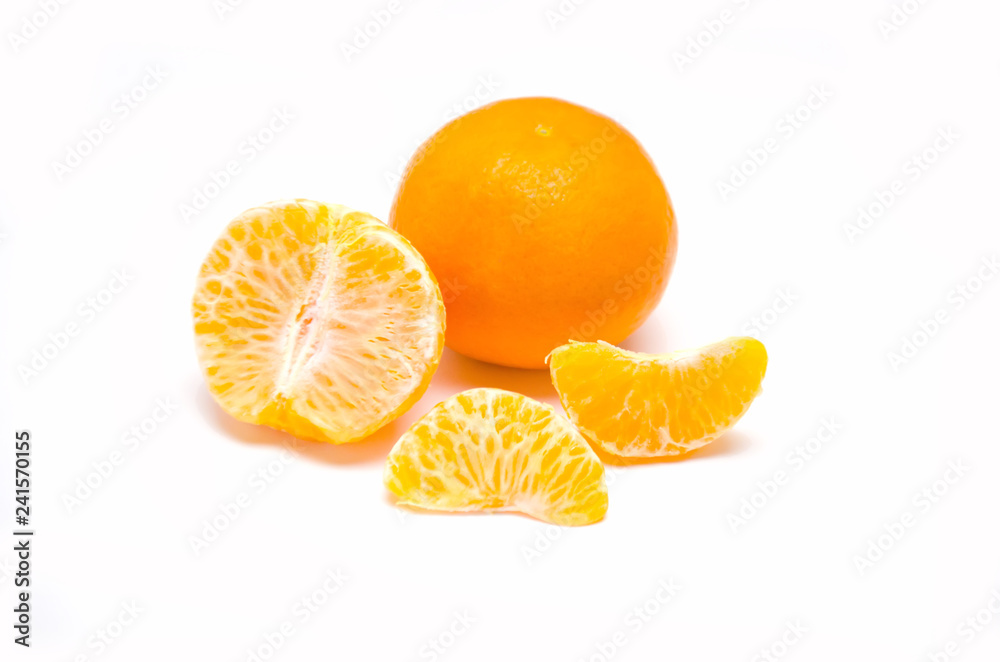 whole tangerine and slices peeled on white background whole tangerine and slices peeled on white background