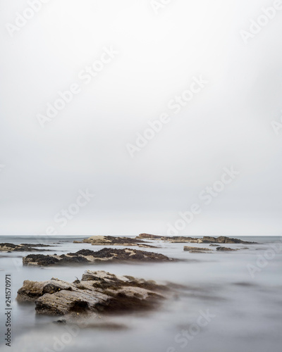 waves breaking on the rocks