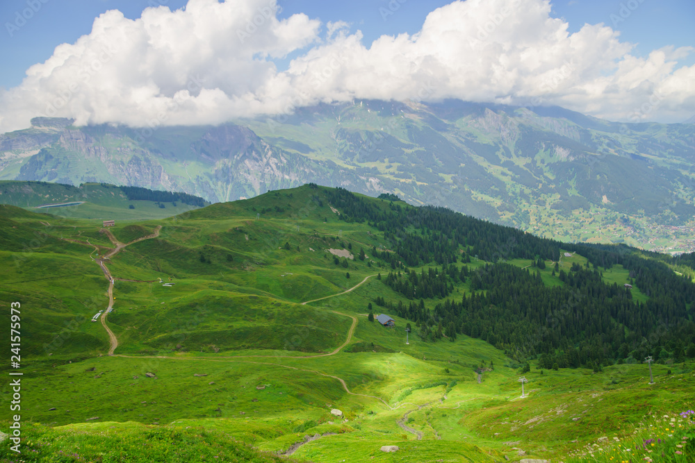Obraz premium Alpine peaks landskape background. Jungfrau, Bernese highland. Alps, tourism, journey, hiking concept.