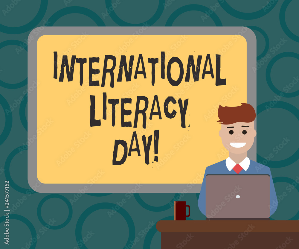Writing note showing International Literacy Day. Business photo showcasing Celebrated annual event on 8 of September Bordered Board behind Man Sitting Smiling with Laptop Mug on Desk Writing note showing International Literacy Day. Business photo showcasing Celebrated annual event on 8 of September Bordered Board behind Man Sitting Smiling with Laptop Mug on Desk