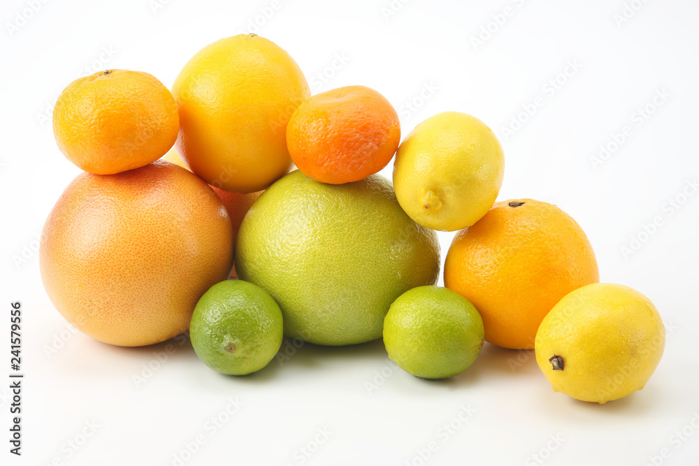 different citrus fruits on white background different citrus fruits on white background